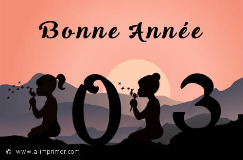 2023 2 petites filles en contre jour forment un 2023 pour souhaiter une bonne année 2023