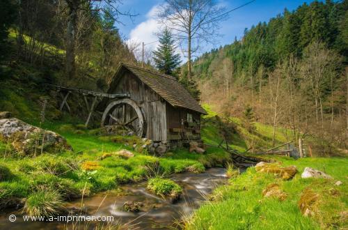 Le petit moulin au bord de l'eau